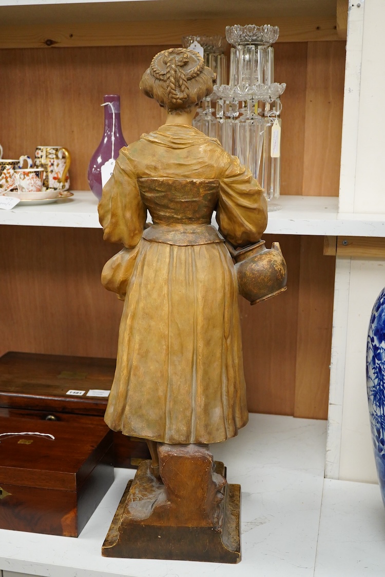 A French pottery figure of a lady, ‘La Cruche Cassée’, manufactured by Van Hasselt & Cie, 73cm